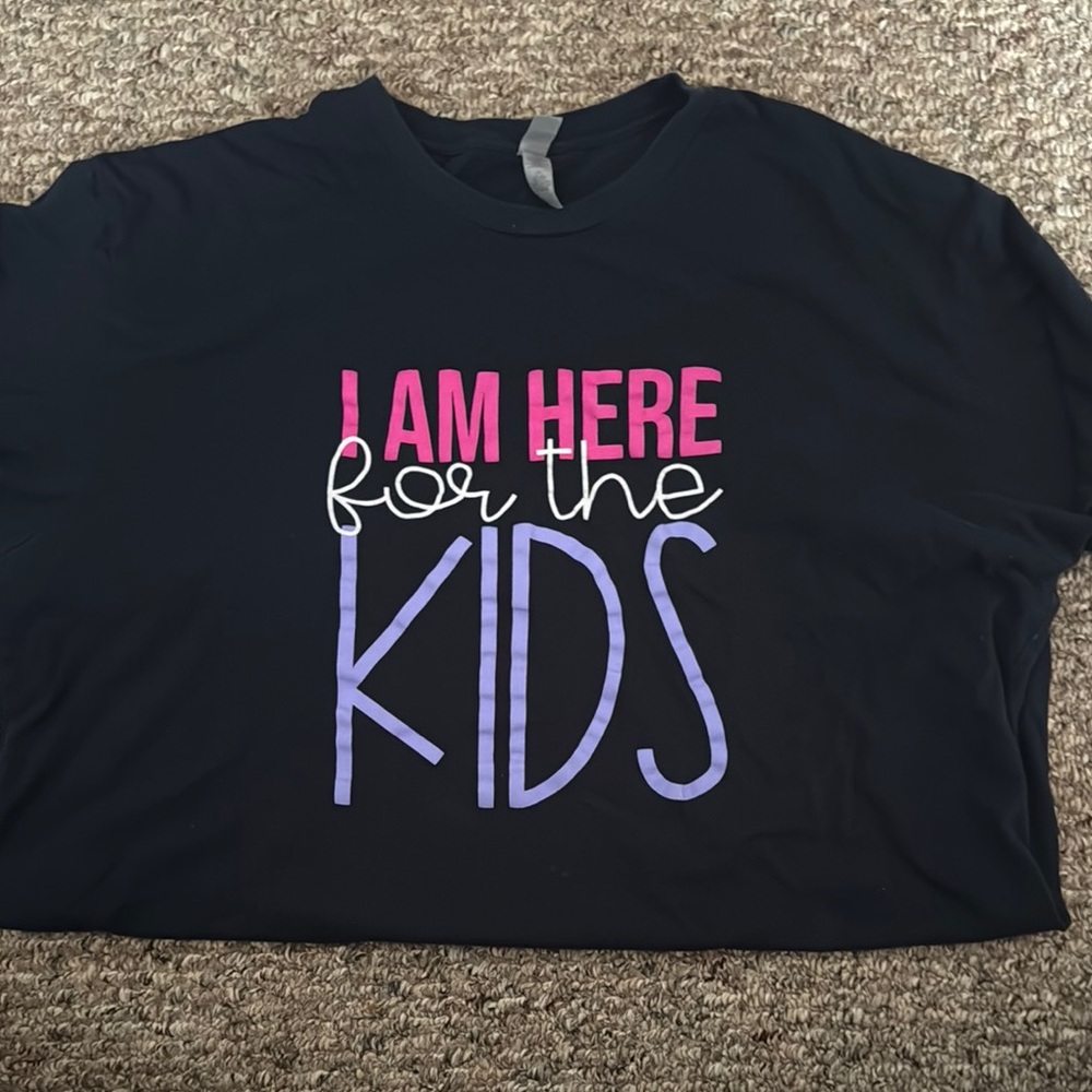 Next Level Apparel Black Tee with Vibrant Text